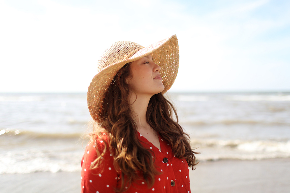 Portrait Of A Young Woman On The Beach